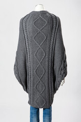 A grey sweater coat for ladies