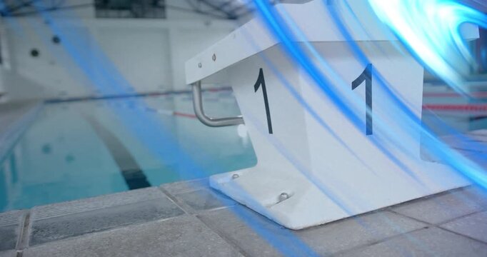 Blue light ribbons sweeping in from right wrapping start block then thinning and revealing platform