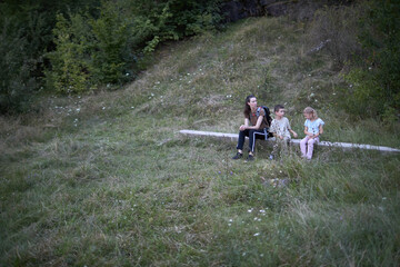 Woman and children hiking