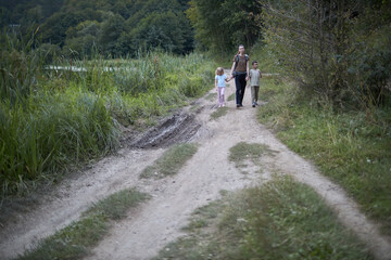 Woman and children hiking