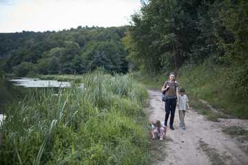 Woman and children hiking
