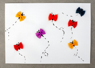 Drawing of butterflies made out of pasta