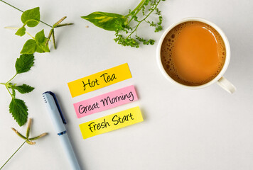 Inspirational Workspace With Coffee and Positive Notes on a Bright Desk