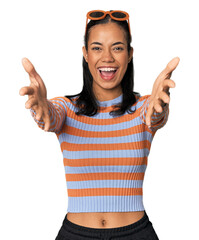 Young Filipino woman in studio feels confident giving a hug to the camera.