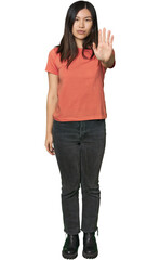 Full-body young Chinese woman standing with outstretched hand showing stop sign, preventing you.
