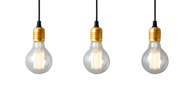 Three vintage light bulbs hanging against a black background, showcasing elegant design and warm illumination.