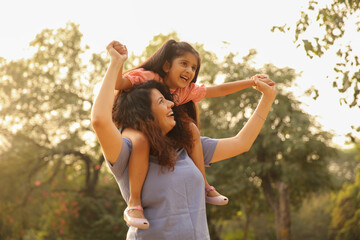 Obraz premium Happy Mother And Daughter In The Park