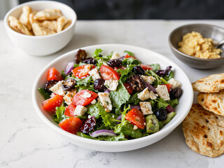 Fattoush salad colorful Middle Eastern salad with crispy pita white bowl