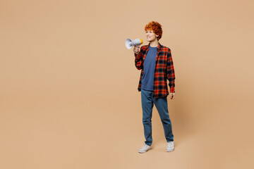 Full body young redhead man he wear red shirt blue t-shirt casual clothes hold in hand megaphone...