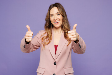 Young smiling happy satisfied woman she wear beige jacket formal clothes showing thumb up like...