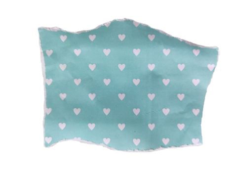 A piece of light blue fabric with small white heart patterns. The fabric is soft and slightly wrinkled, suitable for crafting or sewing projects.