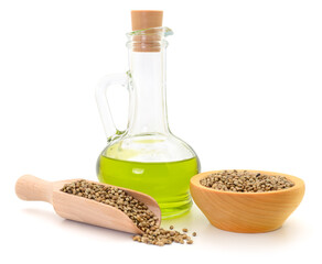 Hemp oil with seeds isolated on white background