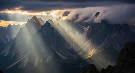 Divine Light Cascading Through Storm Clouds onto Jagged Mountain Spires