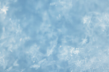 Obraz premium winter snow texture, blue abstract winter cold background snow surface, blurred backdrop