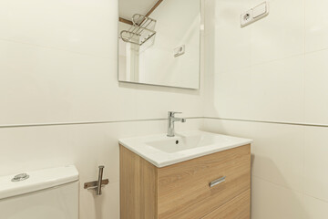 Modern bathroom with an aged oak wall-mounted vanity unit and two drawers, combining character and...