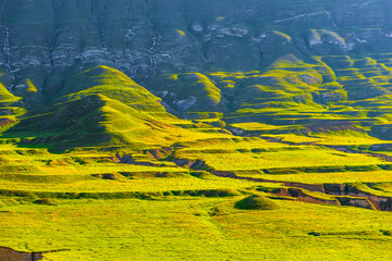 Incredibly beautiful view of the ancient green slope of the mountain plateau with erosion and...