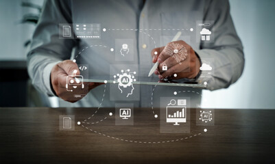 User flowchart, cloud computing, and AI integration visualized on a modern computer screen, showing a person analyzing business processes and data in a digital workspace.