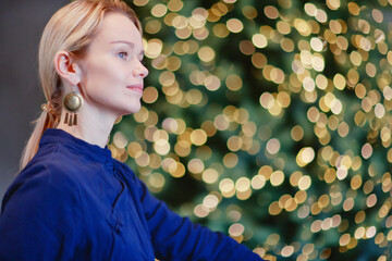 A woman in a Chinese New Year style kimono, a European model poses