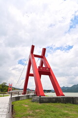 Taiwan - Aug 11, 2025: Tongxin Bridge at Tsengwen Reservoir Scenic Area, Taiwan's largest reservoir...