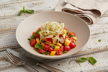 Tomato mango fennel salad