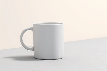 Obraz premium White ceramic mug on a light gray surface clean