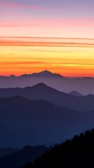 Fototapeta premium Colorful mountain range at sunrise.