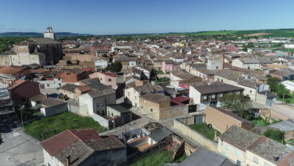 Obraz premium Aerial view of the traditional village of Torquemada with church in Palencia