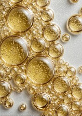 Bubbles in light gold oil background accessories photography.