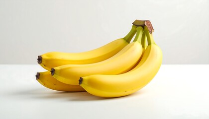 Ripe Yellow Bananas on White.