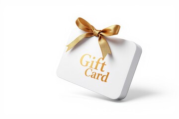 White gift card with golden ribbon bow isolated on white background
