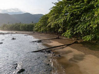 Aerial view of São Tomé’s tropical coastline near São João dos Angolares, with turquoise...
