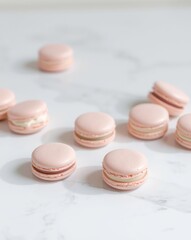 Obraz premium Delicate pink macarons, a sweet and elegant confectionery treat, artfully arranged on a pristine white marble surface, showcasing their beautiful texture and gourmet appeal.