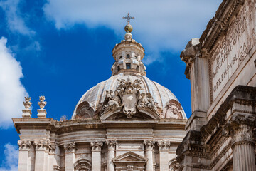 Ancient Roman and Baroque architecture in Rome. Saints Luca and Martina beautiful dome and lantern, built in the 17th century, with ancient roman ruins