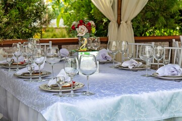 This is an image of a beautifully set dining table