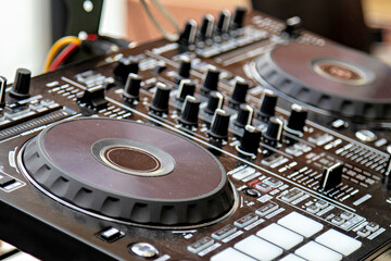 This is an image of a DJ mixing console also known as a DJ mixer