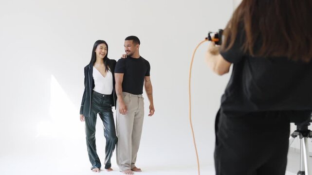 Fashion photoshoot montage, couple posing, photographer capturing moments in slow motion
