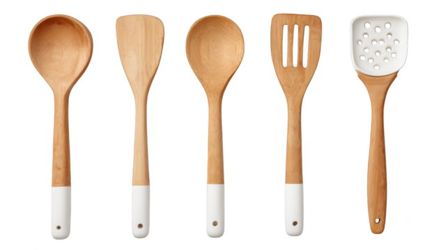 A rustic assortment of handcrafted wooden kitchen utensils featuring a smooth spoon and a flat spatula arranged as a cohesive set for culinary preparation and serving food.