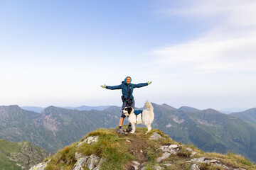 trekking with a dog in hogh mountains