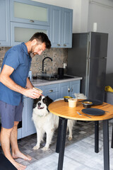 man preparing food in modern kitchen