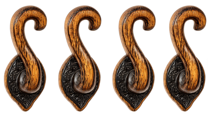 A set of three rustic wooden hooks mounted on a wall each featuring an intricate handcrafted decorative design for hanging coats hats and accessories in a hallway or entryway.