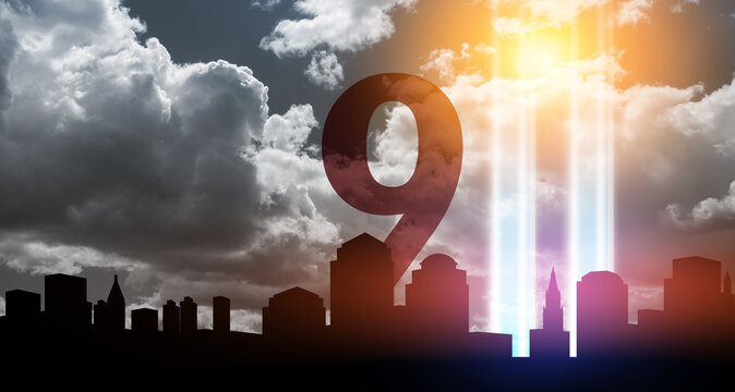 September 11 Tribute In Light Art Installation in the Lower Manhattan New York City Skyline at Sunset. 9.11 concept.