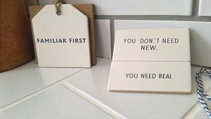 Stylish home decor signs emphasizing authenticity and familiarity