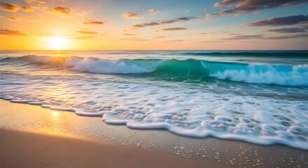 Obraz premium A breathtaking sunrise illuminates the ocean as a gentle turquoise wave washes onto the golden sandy beach.