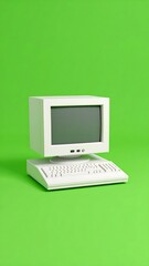 Retro computer on a green backdrop (1)