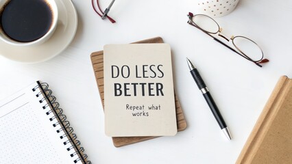 Minimalist workspace with inspirational note and coffee