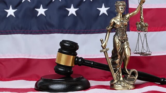 american flag with goddess of justice themis