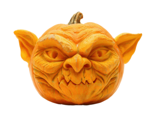 Intricately carved Halloween pumpkin with a menacing goblin face large pointed ears and wrinkled skin.