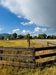 Fototapeta premium Old ranch near town Gardnerville Nevada USA, ranch with fence during daytime against blue sky. High quality photo
