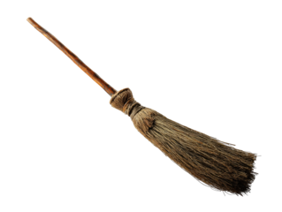 An old rustic witchs broomstick with a gnarled wooden handle and natural twig bristles.