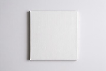 Fototapeta premium Blank White Canvas Square on White Background for Mockup and Design
